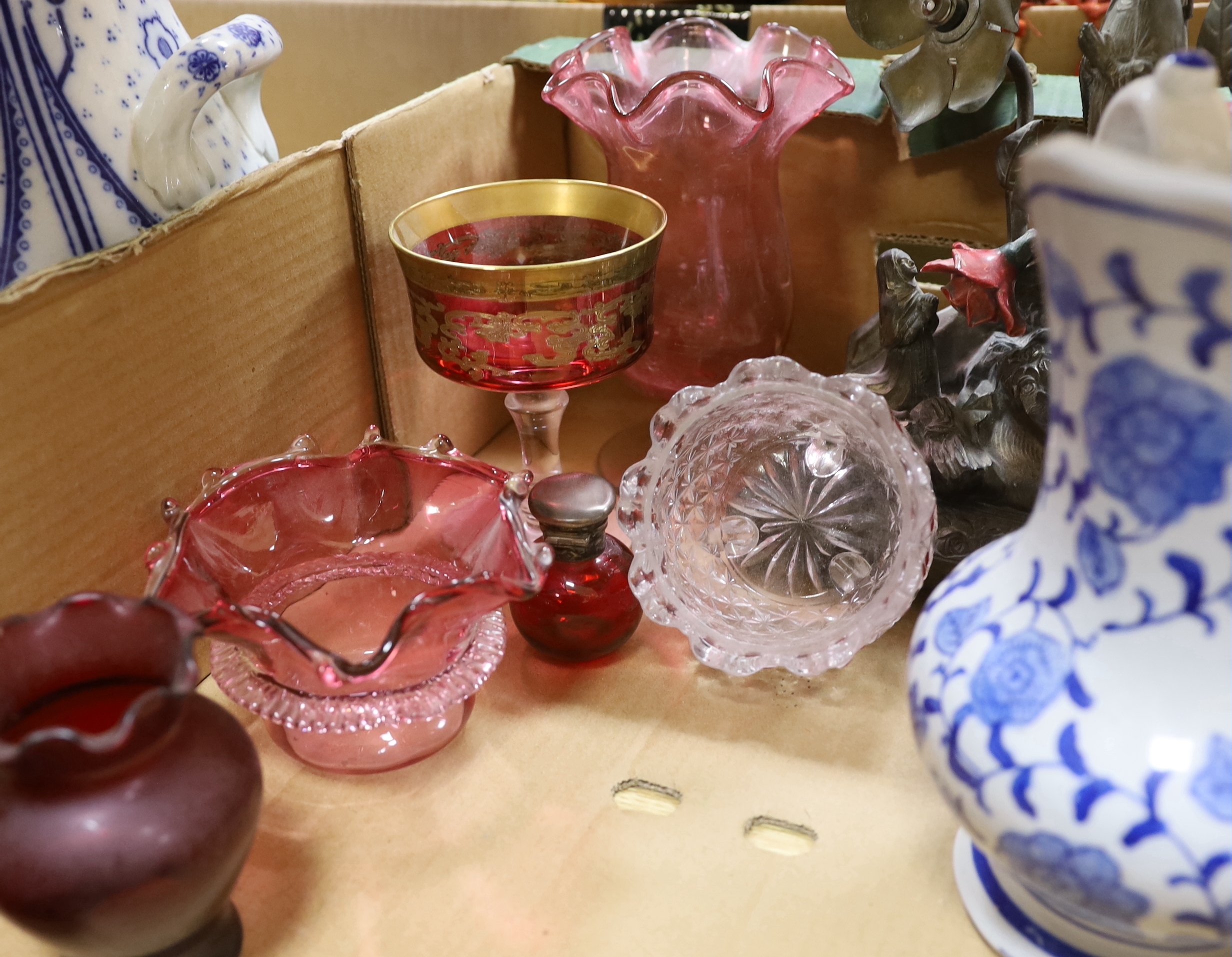 A large Arts and Crafts style two handled blue and white pot, a vase, two jugs, a quantity coloured glass and a table lamp